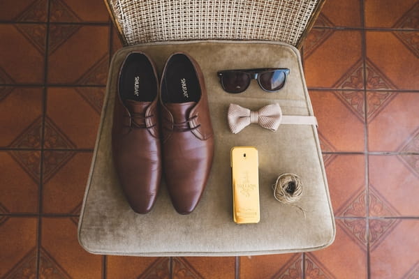 Groom's accessories on chair