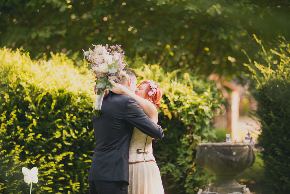 Bride and groom hug