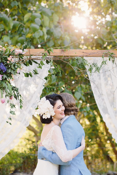 Bride and groom hugging