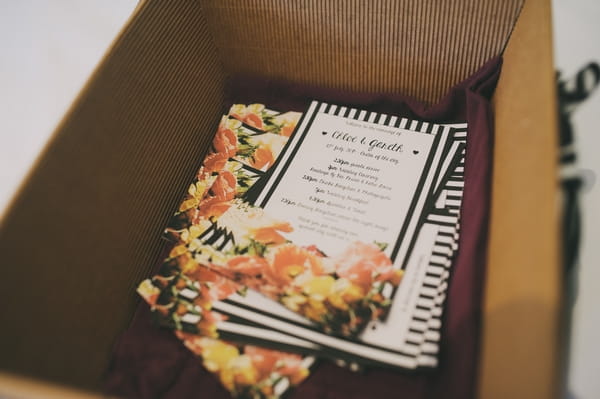 Black and white striped wedding order of service