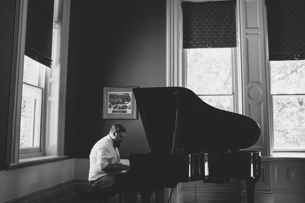 Groom playing piano