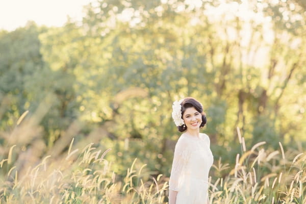 Bride in long grass