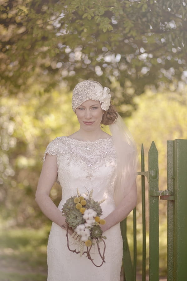 1920's bride holding bouquet