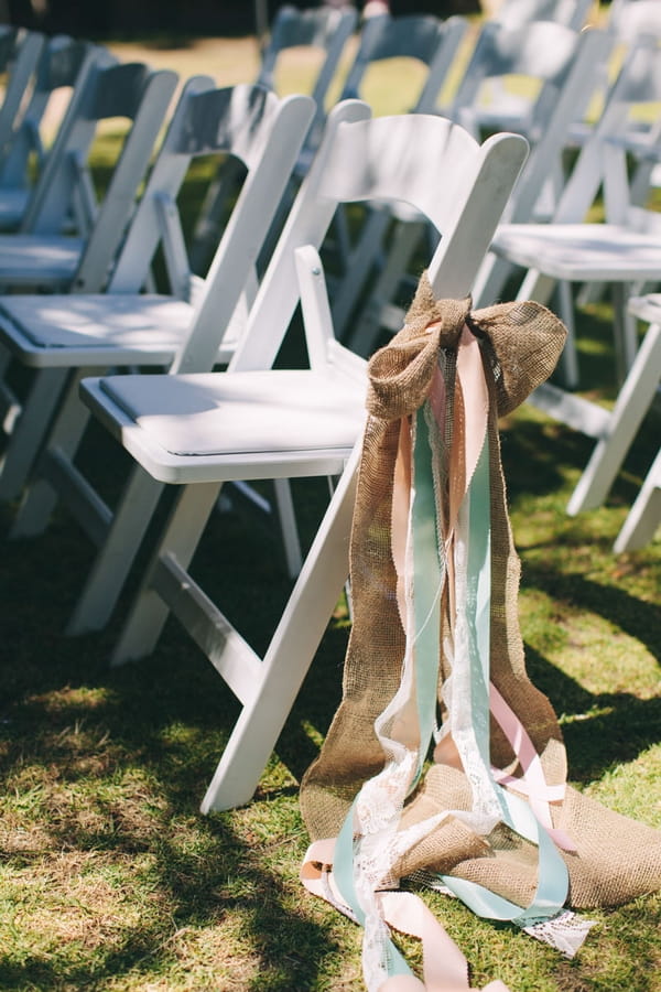 Streamers tied to wedding chair