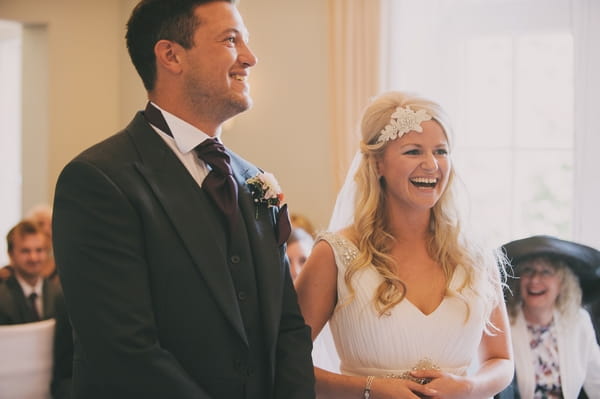 Bride and groom laughing