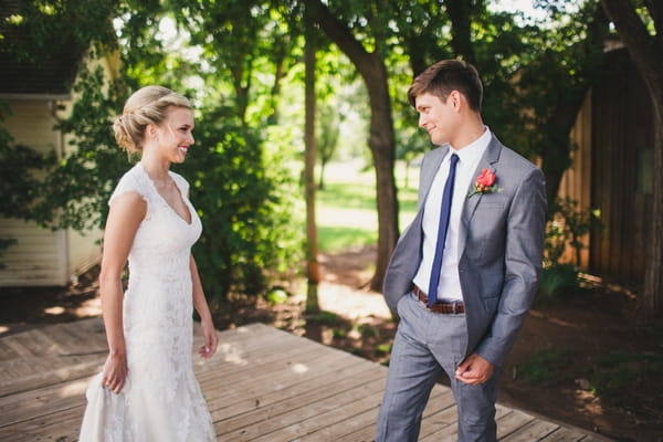 Groom turning to see bride