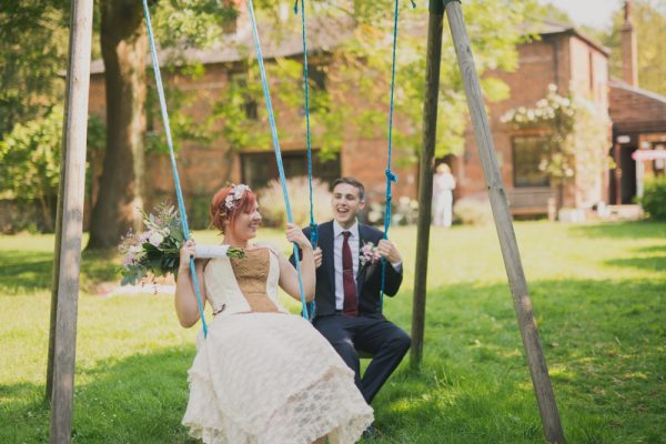 Bride and groom on swings