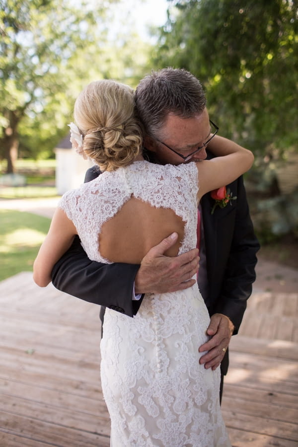 Bride hugging father