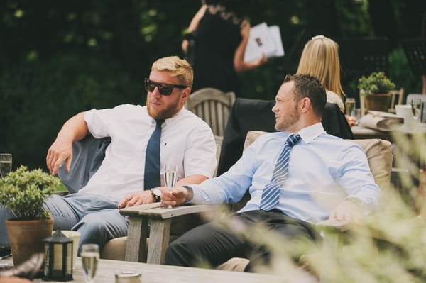 Two men sitting talking