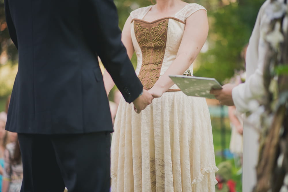 Bride and groom holding hands