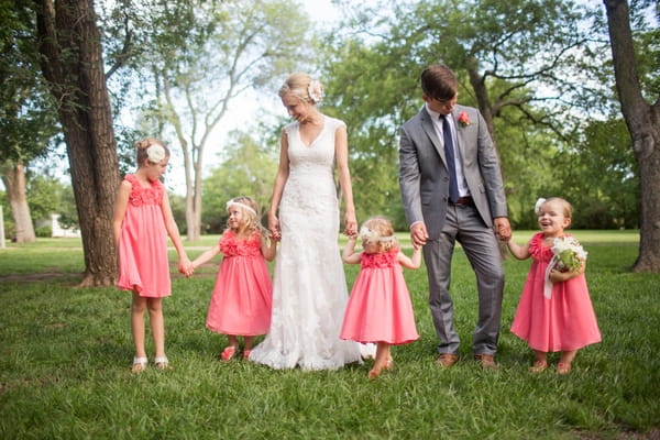 Bride and groom with flower girls