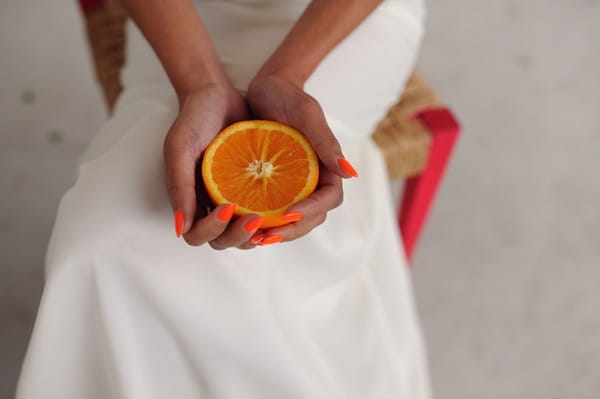 Holding orange