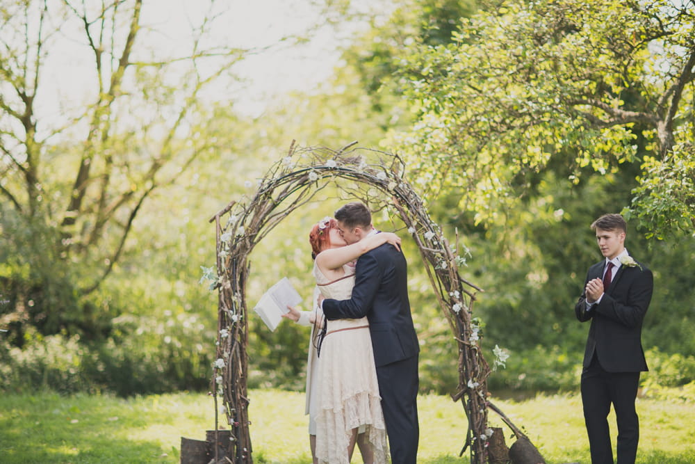 Bride and groom kiss