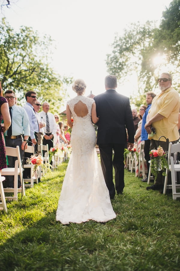 Father walking bride down aisle