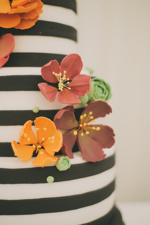 Black and white striped wedding cake