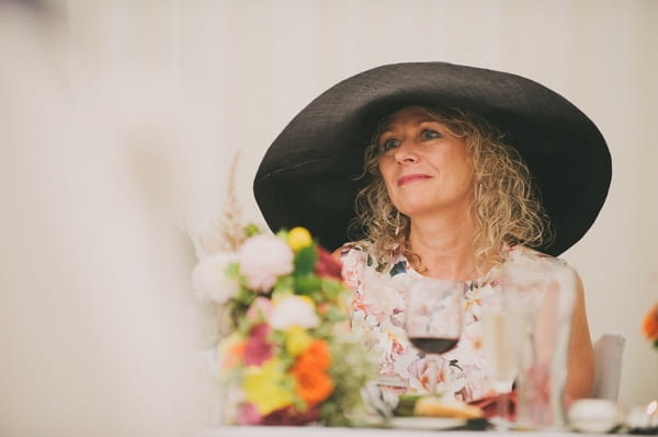 Woman wearing large hat