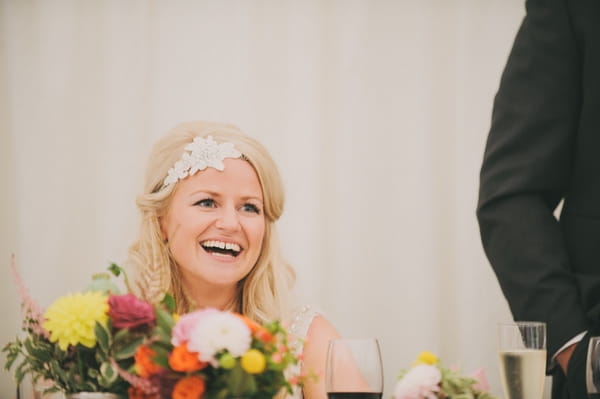 Bride laughing at speech