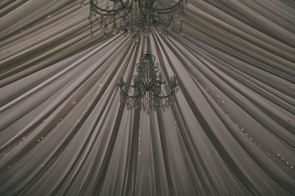 Chandelier hanging in marquee