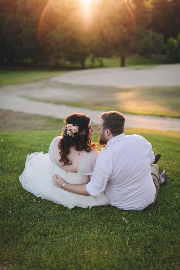 Bride and groom sitting