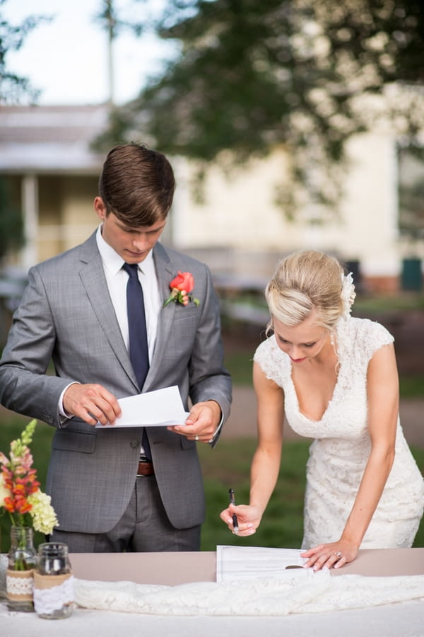 Bride signing register