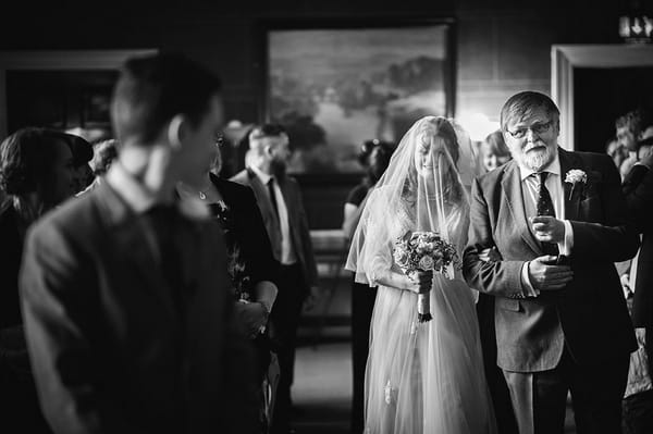 Father of bride pointing at groom - Picture by Martin Makowski Photography