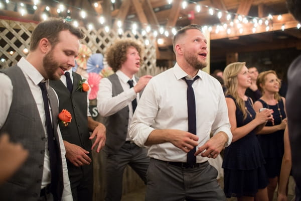 Groomsmen at party