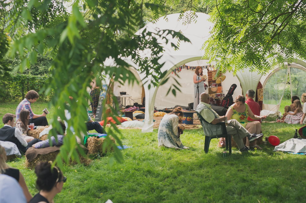 Wedding guests outside tent