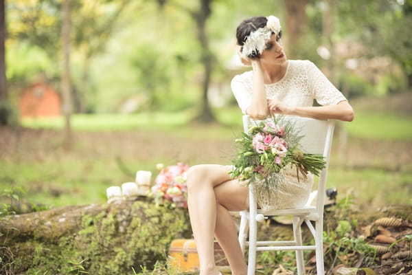 Vintage bride sitting on chair