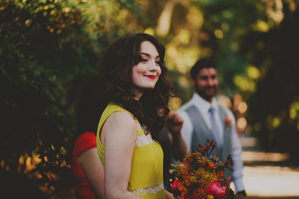 Bridesmaid in yellow dress