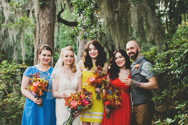 Bride, bridesmaids and groomsman