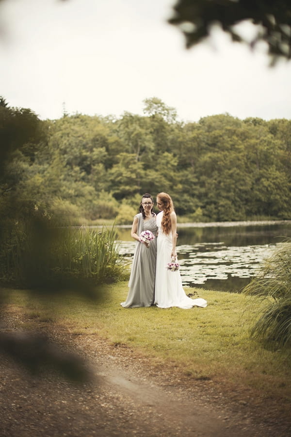 Brides by lake