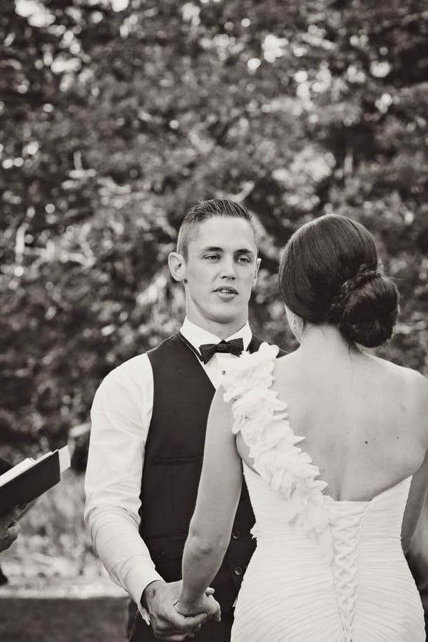 Groom in outdoor wedding ceremony