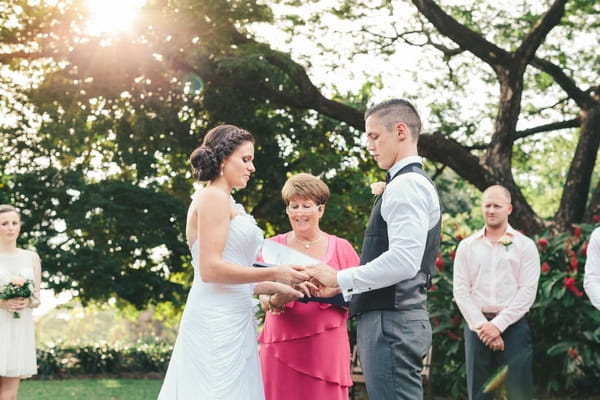 Bride and groom saying wedding vows