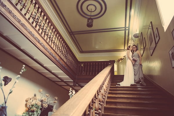 Brides on staircase