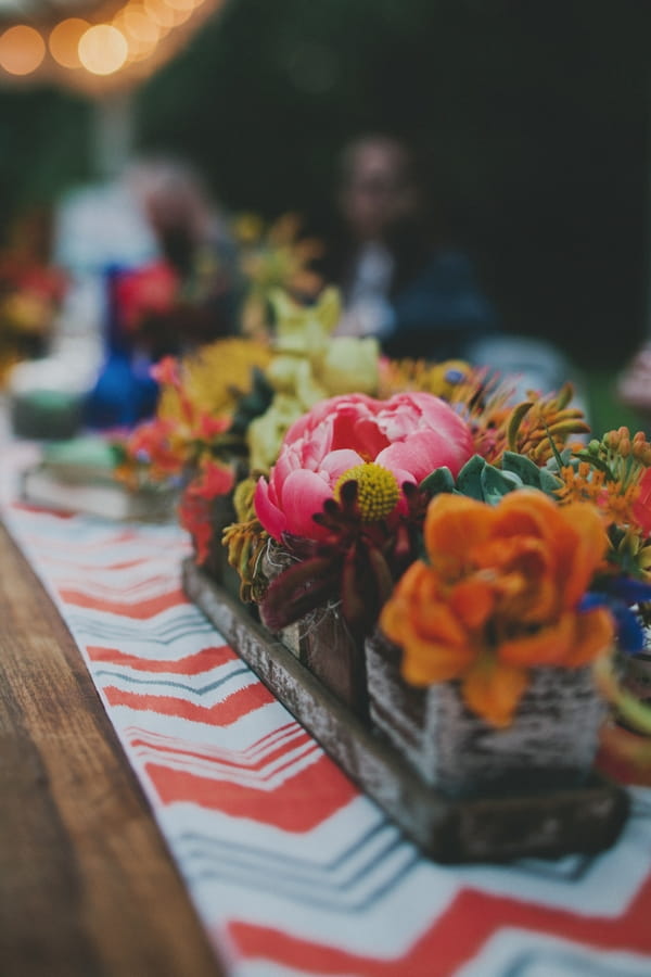 Colourful wedding table flowers