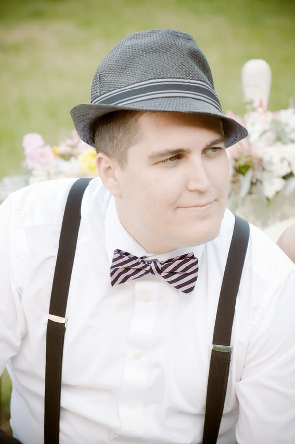 Vintage groom with hat and bow tie