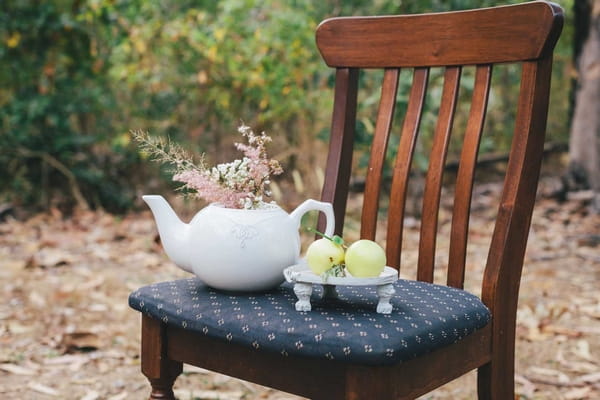 Teapot on chair