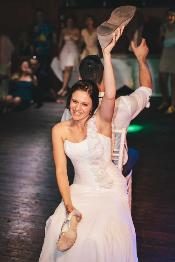 Bride and groom sitting back-to-back