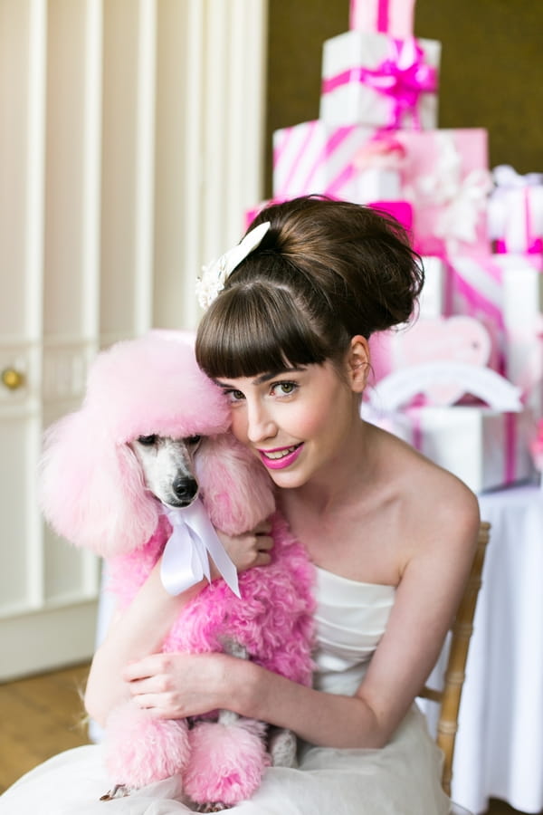 Bride and pink poodle