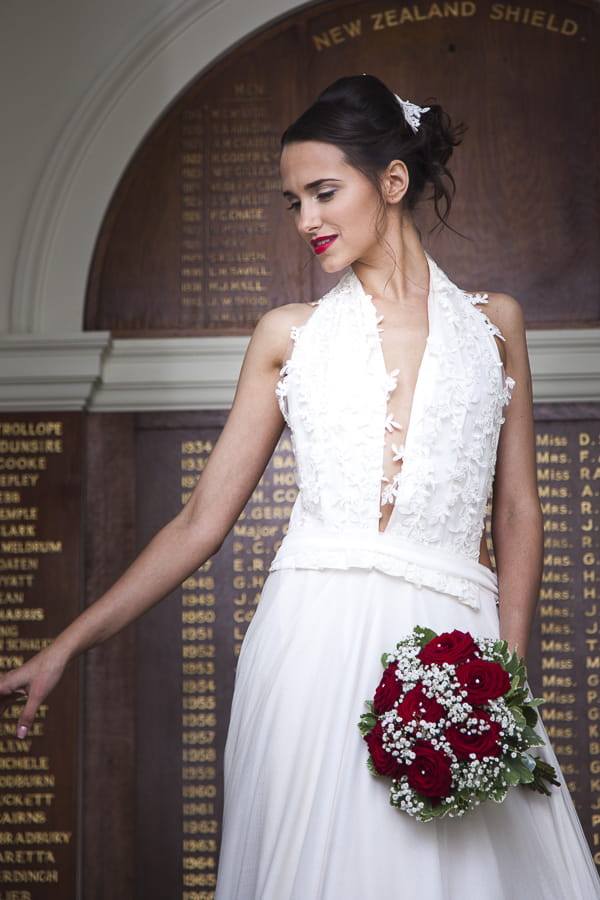 Bride holding winter bouquet