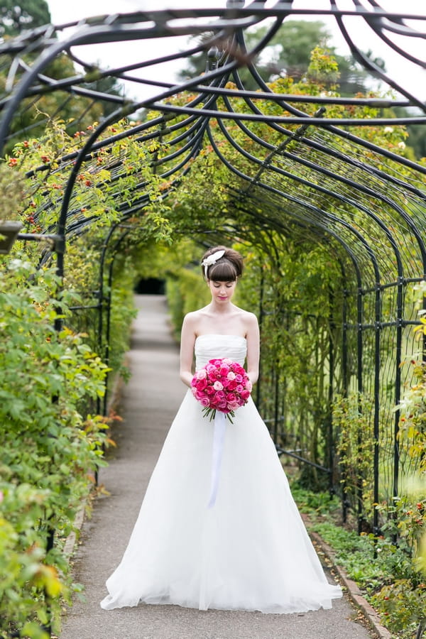 Bride holding pink bouquet