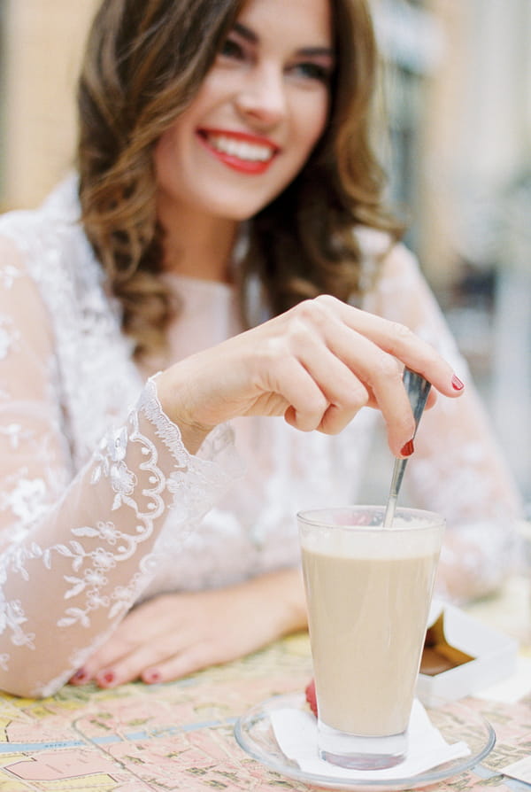 Bride stirring coffee