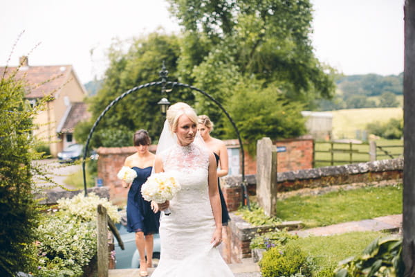 Bride walking up church path