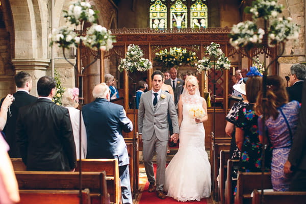 Bride and groom leaving church