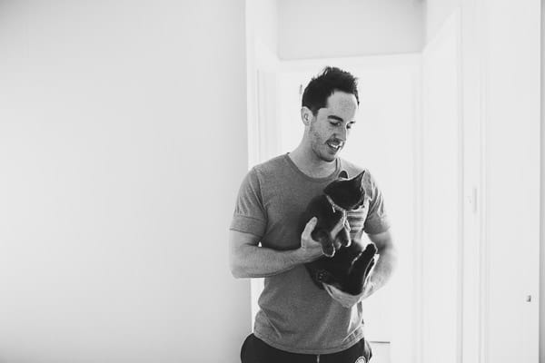 Man holding cat