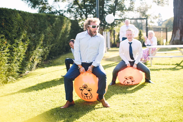 Wedding guests on space hoppers