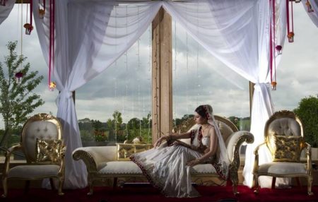 Inidan bride on chaise longue - More Weddings