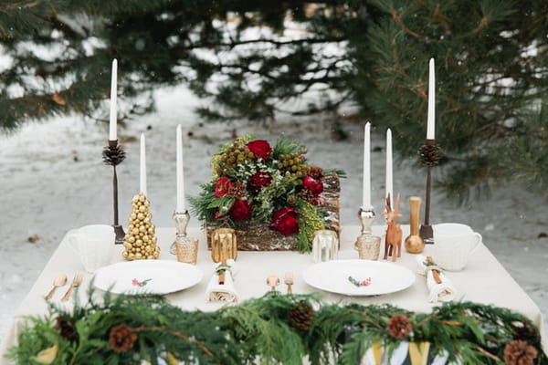 Candles and Christmas table centrepiece