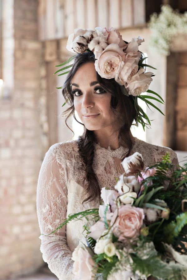 Bride with floral headpiece and bouquet