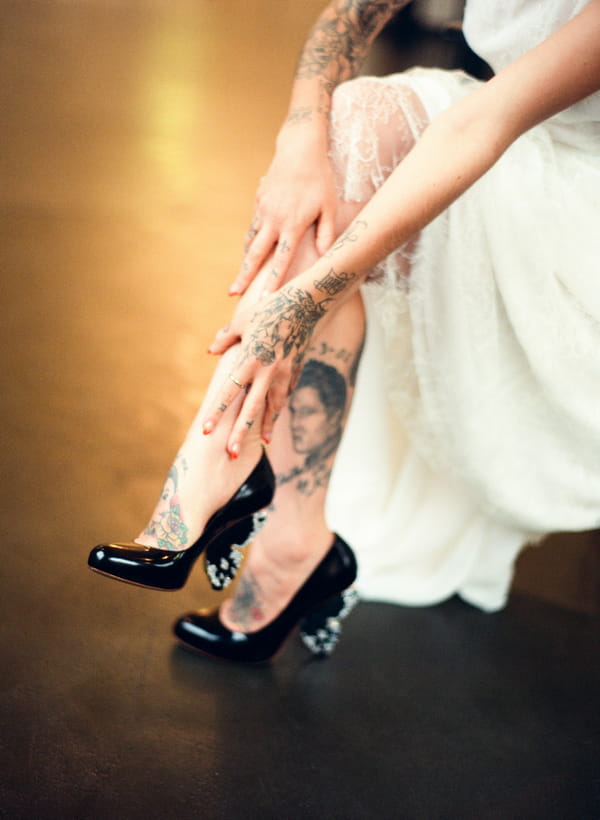 Tattoos on bride's legs